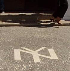 NY in sidewalk