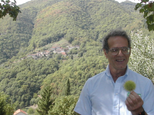 Emilito with found chestnut; Villabuona in background