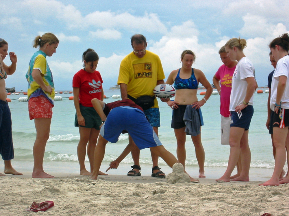 Is
          Dana pointing at Daniela's toes?