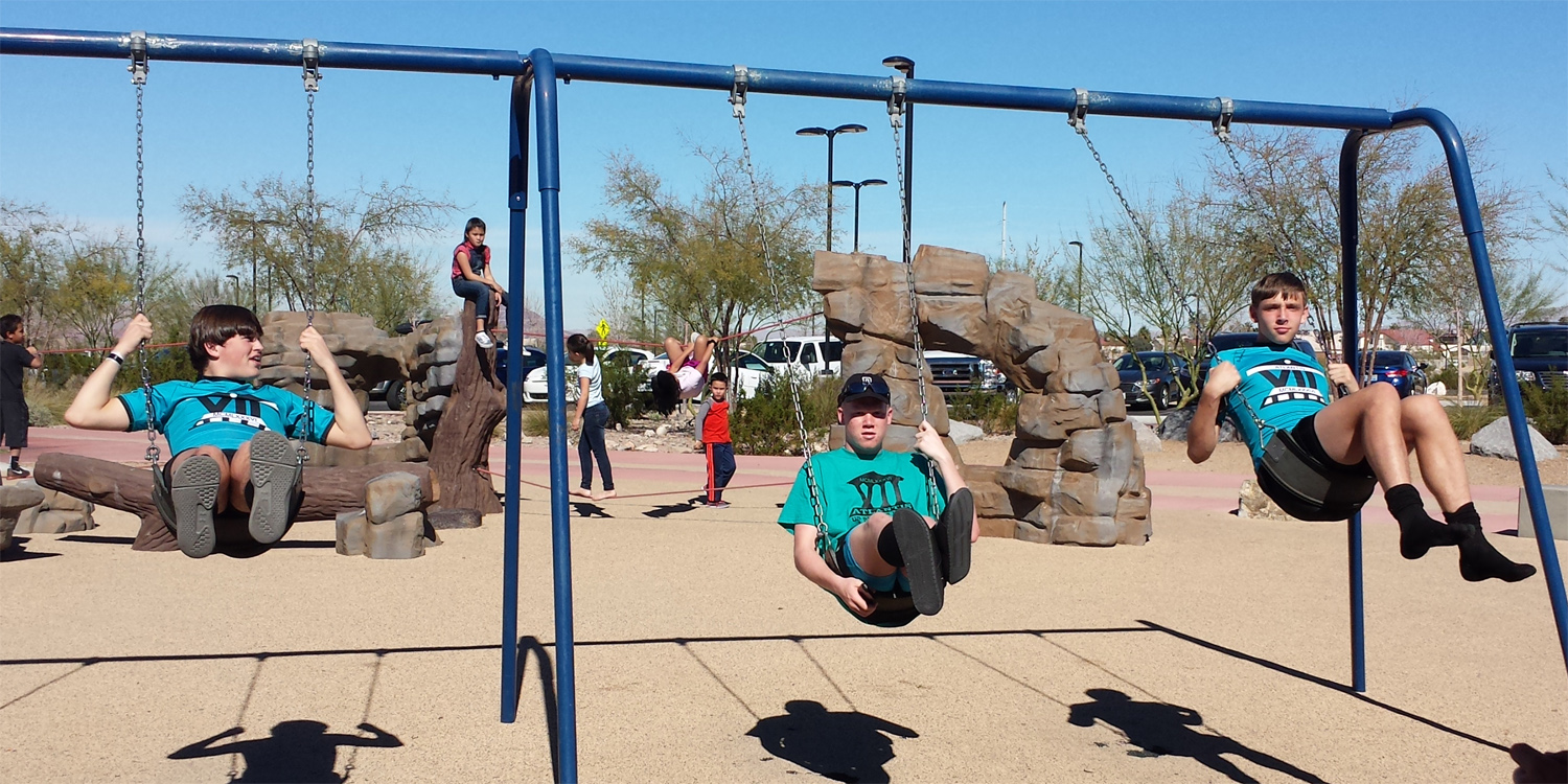 Boys on swings
