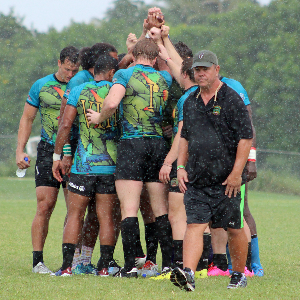 Men huddle