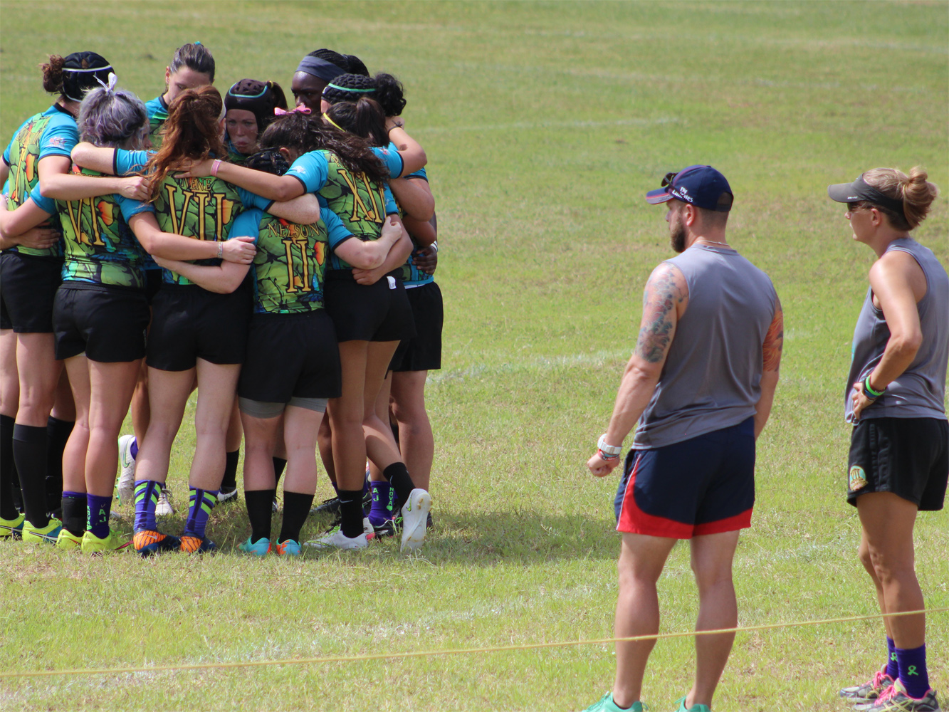 Men huddle