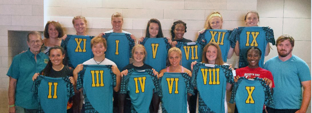 Girls
          at jersey ceremony night before tournament
